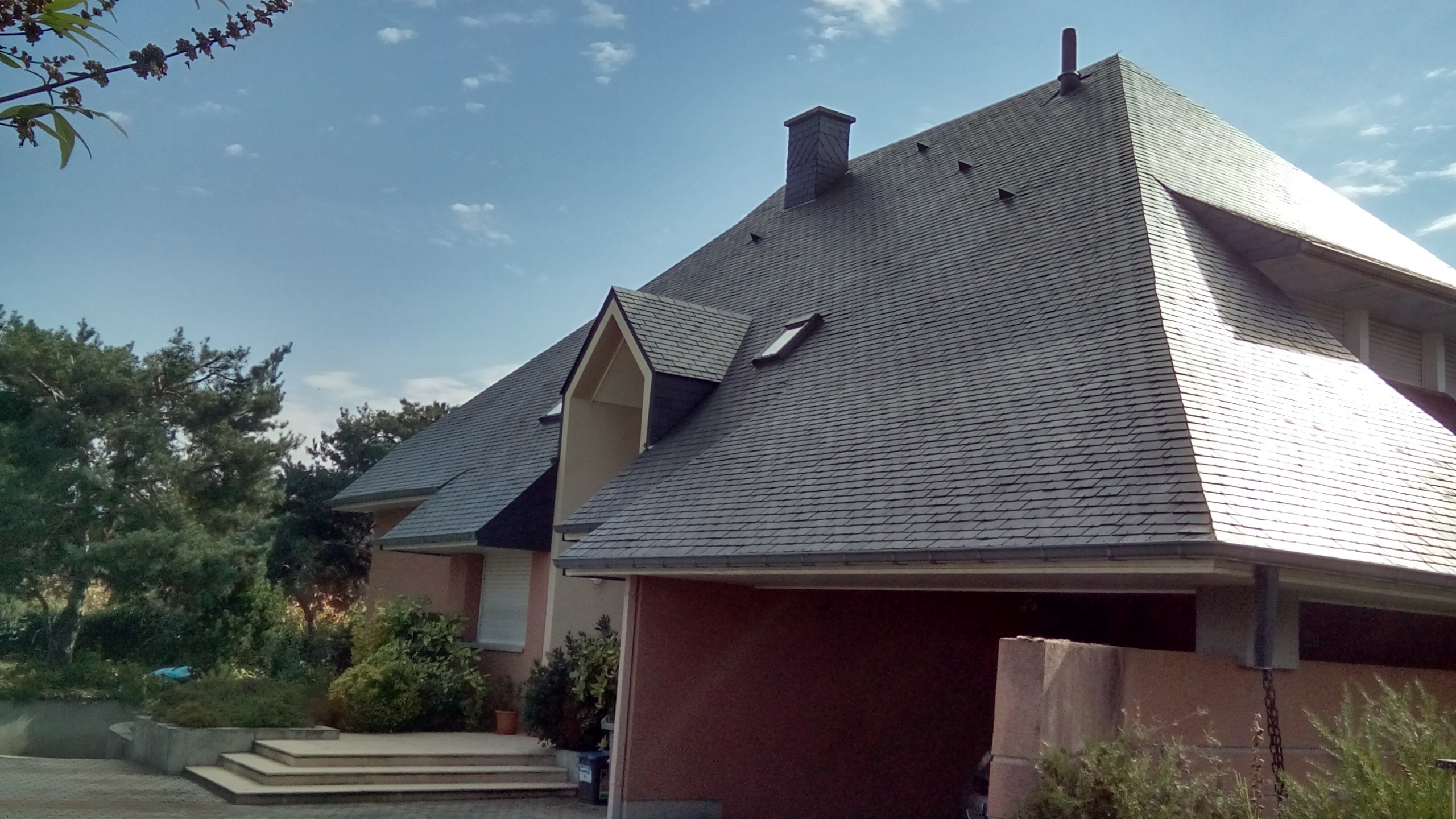 Démoussage de couverture